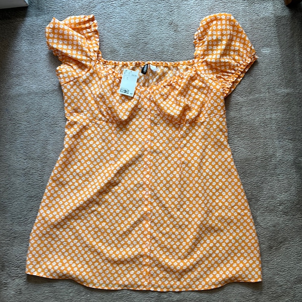 Orange flower dress.